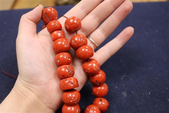 Mixed jewellery including costume, an amber necklace and a carved cameo shell.